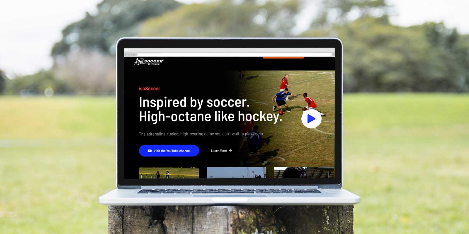 A laptop with the homepage of a soccer website.